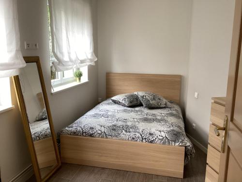 Ένα ή περισσότερα κρεβάτια σε δωμάτιο στο Appartement élégant idéal pour 2 personnes