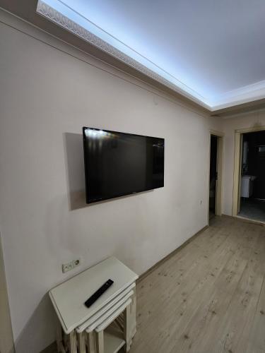 Televisyen dan/atau pusat hiburan di Esa Apart Hotel