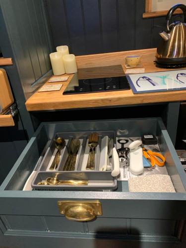a kitchen counter with a sink in a drawer at Church House Hut in Melton Mowbray