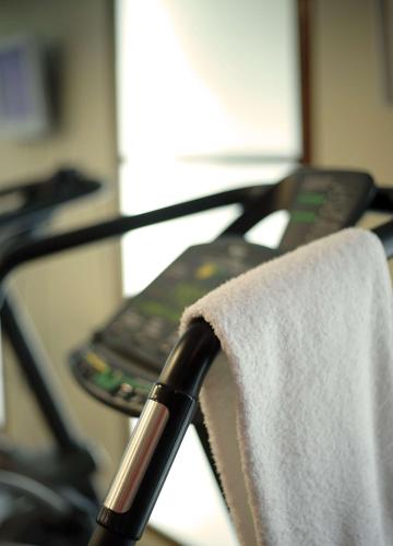 a towel is hanging on the back of a chair at Park Plaza Victoria London in London