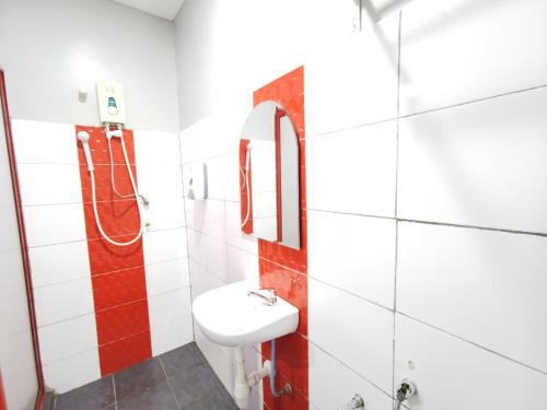 a bathroom with a sink and a shower at Best Hotel Shah Alam @ UITM, i-City & Hospital in Shah Alam