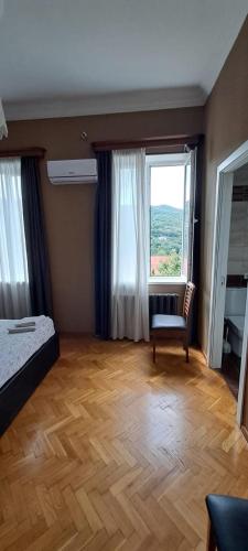 Guest House Pirosmani 60にあるベッド