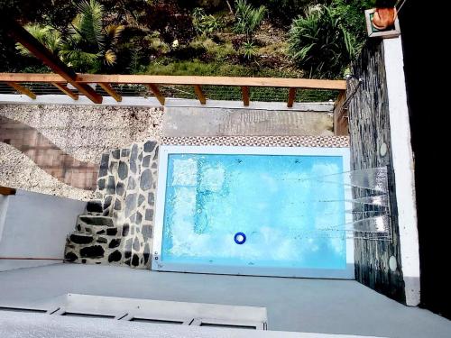 Výhled na bazén z ubytování Villa de Hermosos Atardeceres y Amanceres nebo okolí