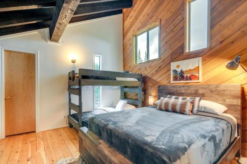 a bedroom with a bunk bed and wooden walls at Brian Head Vacation Rental Walk to Giant Steps! in Brian Head