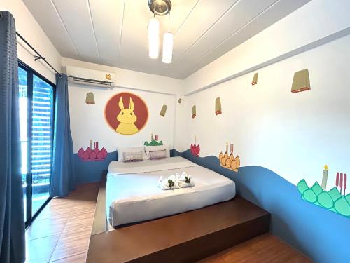 a bedroom with a bed in a room at Hide Bangkok Hostel in Bangkok