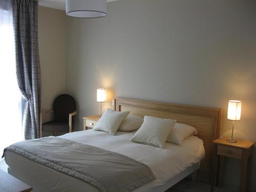 Postel nebo postele na pokoji v ubytování Domitys Le Parc Balsan