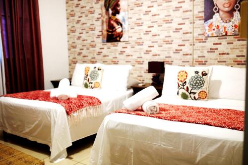 Letto o letti in una camera di Panama House Bed & Breakfast