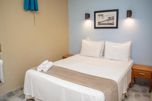 Cama o camas de una habitación en Pousada Villa Mariana