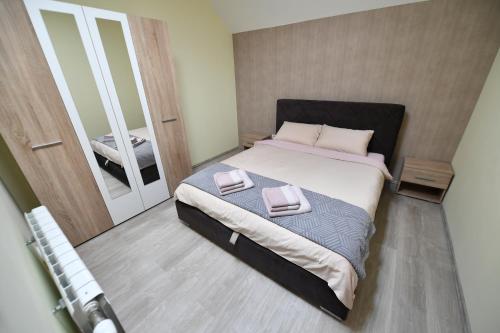 Postel nebo postele na pokoji v ubytování Lux J.S.L.T.