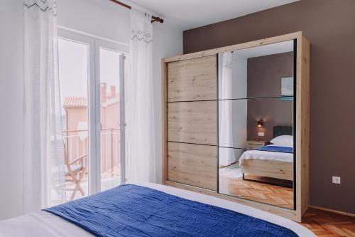 Postel nebo postele na pokoji v ubytování Apartment Walter