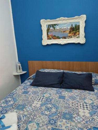 Postel nebo postele na pokoji v ubytování Sicilia bedda 1