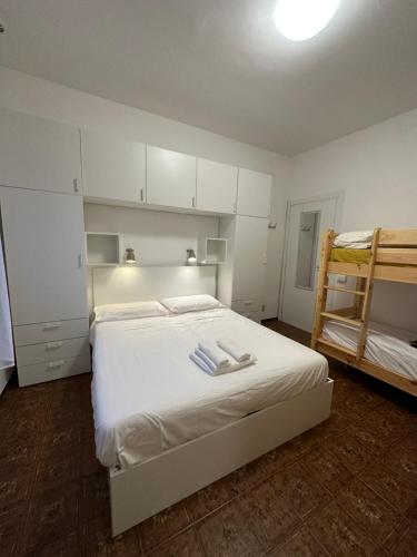 Llit o llits en una habitació de Appartamento Rivarola Ulivo