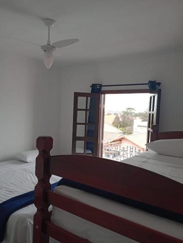 Ένα ή περισσότερα κρεβάτια σε δωμάτιο στο Hostel Boituvillage