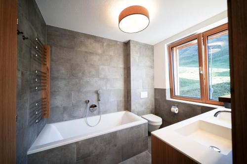 Ванна кімната в Berg Aparts - Top 6 - Faschina - mit Sauna & 2 Bädern