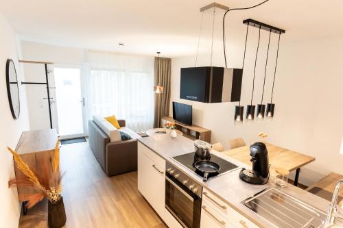 Kuchyň nebo kuchyňský kout v ubytování Kapfwald Appartements