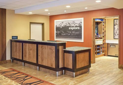 a lobby of a store with a counter in a room at Hampton Inn & Suites Silverthorne in Silverthorne