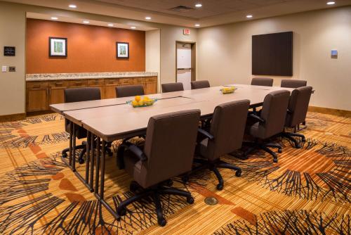 a conference room with a large table and chairs at Hampton Inn & Suites Silverthorne in Silverthorne