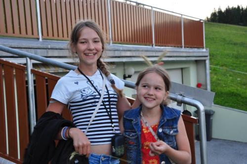 a woman and a girl posing for a picture at Alpenpension Gasthof in Ratten