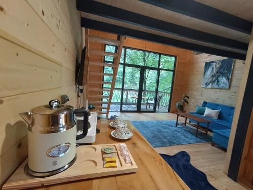 a kitchen with a tea kettle on a counter at SAMUR DAĞ EVLERİ in Rize