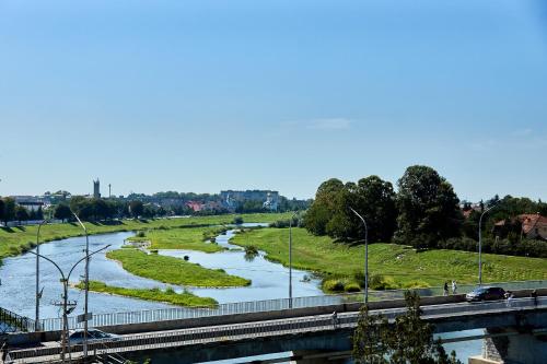 a view of a river from a bridge at Wonderful Panoramic View Apartment in Mukacheve