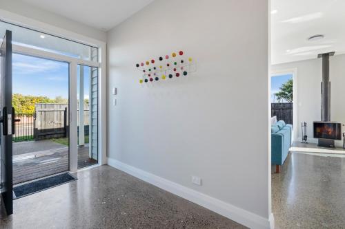 TV o dispositivi per l'intrattenimento presso Stylish Serenity - Martinborough Holiday Home