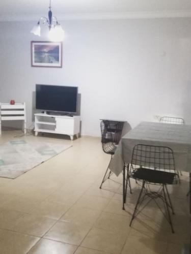 Μια τηλεόραση ή/και κέντρο ψυχαγωγίας στο Kuşadası Triplex 5-1 Villa