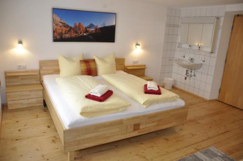 Ένα ή περισσότερα κρεβάτια σε δωμάτιο στο Flierelerhof