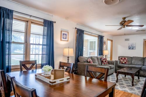 a living room with a table and a couch at Spacious 4 Bedroom Home with 5 Beds near Interstate 40 in Amarillo, TX in Amarillo