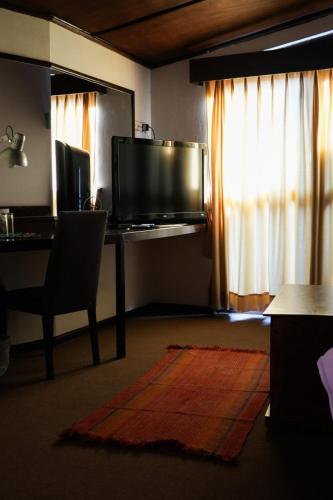 Televisyen dan/atau pusat hiburan di Hotel Pilancones