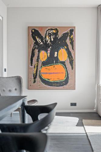 a room with a painting of a bat on the wall at City View Lux in the City Center with Free Parking in Reykjavík