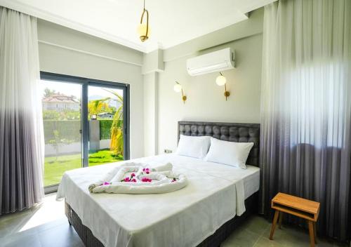 Postel nebo postele na pokoji v ubytování Dalyan Villa Alba