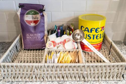 a basket with utensils and a spoon on a counter at Parker House - 15 mins to Downtown Asheville in Fairview