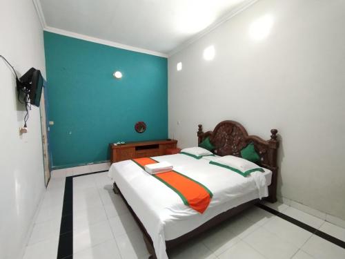 Кровать или кровати в номере Homestay Simply Homy dekat Tugu Jogja dan Monjali