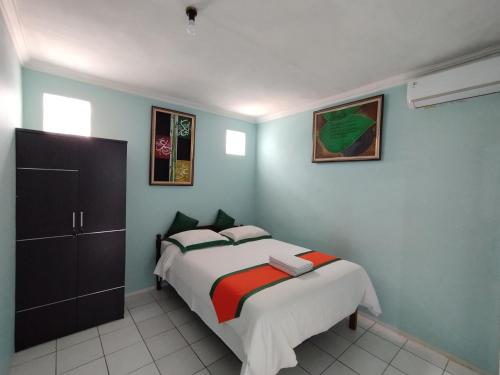 Кровать или кровати в номере Homestay Simply Homy dekat Tugu Jogja dan Monjali