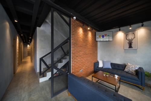 Zona de estar de Cove W Suites