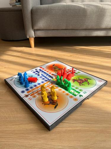 a toy board sitting on the floor in a living room at Hoa Homestay Hạ Long 2909 in Ha Long
