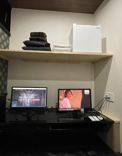 En TV eller et underholdningssystem på Fujiko Building 3F - Vacation STAY 35722v