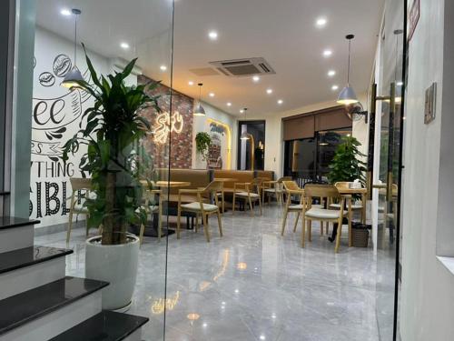 Reštaurácia alebo iné gastronomické zariadenie v ubytovaní Snu Motel - Cao Bằng