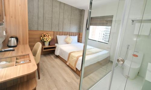 Een bed of bedden in een kamer bij Prague Nha Trang