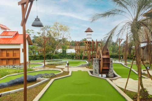 a golf course at the resort at Novus Giri Resort & Spa in Puncak