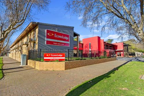 a building with a sign on the side of it at Econo Lodge East Adelaide in Adelaide