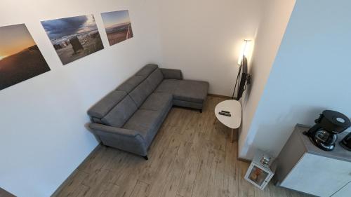 an overhead view of a living room with a couch at Ferienwohnung Am Kleinen Haff in Garz-Usedom