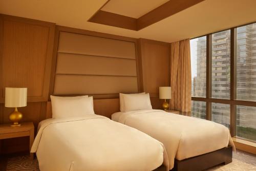 Cama o camas de una habitación en Banyan Tree Bangkok