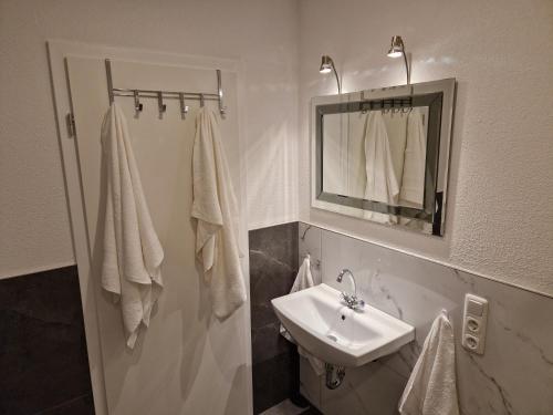 Ванна кімната в Capital Apartments
