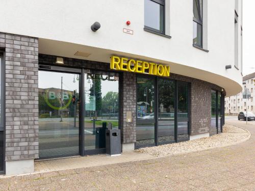 a building with a rejection sign on the front of it at B&B Hotel Krefeld in Krefeld