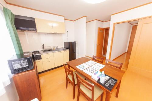 Dapur atau dapur kecil di Restful Tsukuda