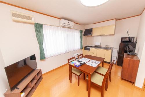 Dapur atau dapur kecil di Restful Tsukuda