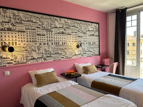 two beds in a room with a large mural on the wall at Hôtel de la Croix-Rousse in Lyon