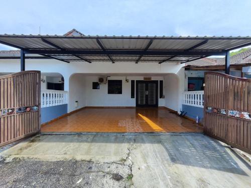 an inside view of a building with a large open door at Aydan Homestay, UTM, Taman Sri Pulai, Skudai in Johor Bahru