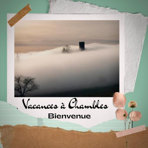 a picture frame with a picture of a foggy sky at Maisonnette jardin jacuzzi au cœur de Chambles in Chambles